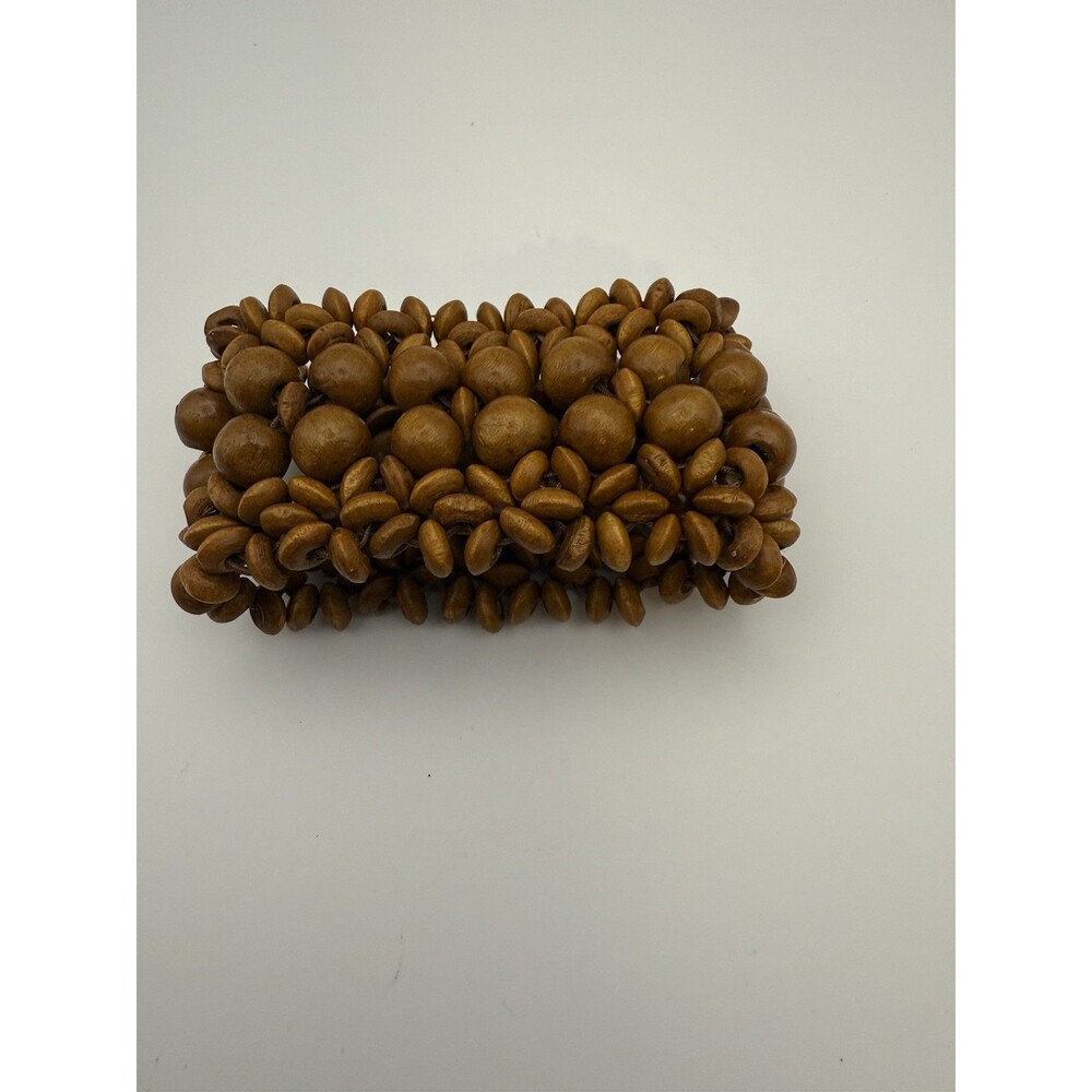 Wide Dark Brown Wood Stretch Bracelet With A Mix Of Round And Disk Wood Beads.